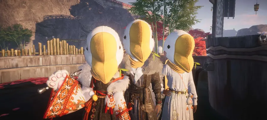 Three hooded figures