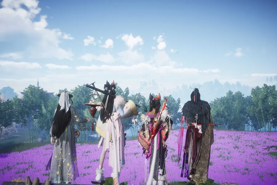 Guild members gathered in a field of purple flowers.